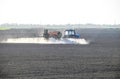 The tractor sprayed herbicides on the field. Chemistry in agricu Royalty Free Stock Photo