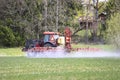 Tractor and Sprayer in Field in the Spring Royalty Free Stock Photo
