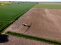 Tractor with sprayer machine working in fields, Zulawy Wislane