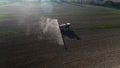 Tractor Spraying Fields on an Arable Farm with Glyphosate Herbicide