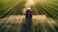 Tractor Spraying Pesticide on Wheat Field Royalty Free Stock Photo
