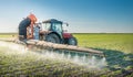 Tractor spraying pesticides Royalty Free Stock Photo