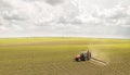 Tractor spraying pesticides at soy bean field Royalty Free Stock Photo