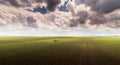 Tractor spraying pesticides on soybean field with sprayer at spring Royalty Free Stock Photo