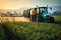 Tractor spraying pesticides on soybean field with sprayer at spring, Tractor spraying pesticides fertilizer on soybean crops farm Royalty Free Stock Photo