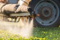 Tractor spraying soybean field at spring Royalty Free Stock Photo