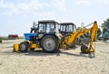 Tractor, standing in a row. Agricultural machinery.