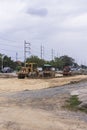 Tractor with Steamroller road roller leveling working