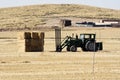 Tractor and straw packages Royalty Free Stock Photo