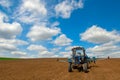 Tractor in tilth Royalty Free Stock Photo