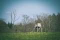 Tractor tire tracks in green grass - vintage retro look Royalty Free Stock Photo