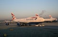 Tractor towing a passenger jet at LHR