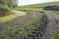 Tractor tracks in rough terrain