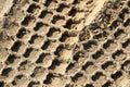 Tractor tracks in sand
