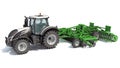 Tractor with Trailed Disc Harrow farm equipment 3D rendering on white background