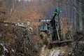 A tractor with a trailer adapted to work in the forest. The Carpathians, Poland Royalty Free Stock Photo
