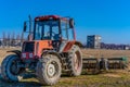 Tractor with trailer in the field Royalty Free Stock Photo