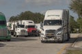 Tractor with trailer leaving truck stop rest area, Florida, USA Royalty Free Stock Photo