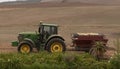 Tractor and trailer loaded with lime. African farm.