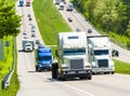 Tractor Trailer Rigs Lead Traffic Up A Tennessee Interstate Incline REVISED Royalty Free Stock Photo