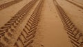 Tractor tyre tracks on the beach, big tyre tracks Royalty Free Stock Photo