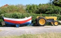 Tractor and wooden fishing boat