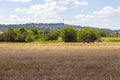 Tractor and beutiful town landscape