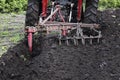 Tractor working on the farm, a modern agricultural transport, a farmer working in the field, fertile land, cultivation of land, Royalty Free Stock Photo