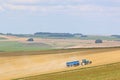 Tractor working Fields of the Pewsey Vale, Wiltshire Royalty Free Stock Photo