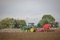 Tractor sowing seeds while srrounded by gulls. Royalty Free Stock Photo