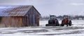 Tractors on Farm Near Old Barn Building Farming Equipment Royalty Free Stock Photo