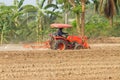 Tractors plow the farm Royalty Free Stock Photo