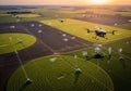 Tractors are visible in the fields, working in various areas Royalty Free Stock Photo