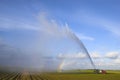 Tractors watering plants Royalty Free Stock Photo