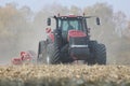 Tractors working on a corn field in czech republic