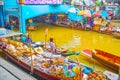 Trade activity in Damnoen Saduak floating market, Thailand