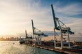 Trade, commerce, business. Maritime container port with cargo ship, cranes. Sea port, terminal or dock. Freight Royalty Free Stock Photo