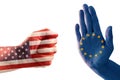 Trade conflict, fist with USA flag against a hand with European