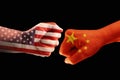 Trade conflict, fists with the flags of USA and China against ea Royalty Free Stock Photo