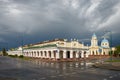 Trade rows - White shops and Alexander Nevsky Cathedral in Pruzhany city, Belarus