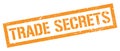 TRADE SECRETS orange grungy rectangle stamp