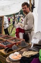 Trade Slavic household items at the festival of historical clubs in the Kaluga region of Russia.