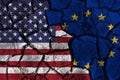 Trade war between United states of america Versus Europe . flag on cracked wall background . Confliction and crisis concept Royalty Free Stock Photo