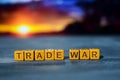 Trade war on wooden blocks. Cross processed image with bokeh background Royalty Free Stock Photo