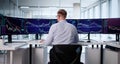 Trader Analyzing Stock Data On Multiple Computer Monitors Royalty Free Stock Photo