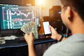 Trader holding USD dollar trading money exchange with crypto blockchain online