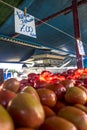 Traders sell fresh tomatoes as retail sales to consumers on street market in Sao Paulo Royalty Free Stock Photo