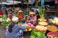 Traders in traditional fresh vegetable market, Vietnam