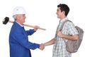 Tradesman meeting new apprentice Royalty Free Stock Photo