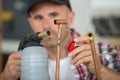 Tradesman soldering with blow torch Royalty Free Stock Photo